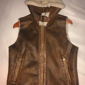 Women’s brown leather Michael Kors vest.